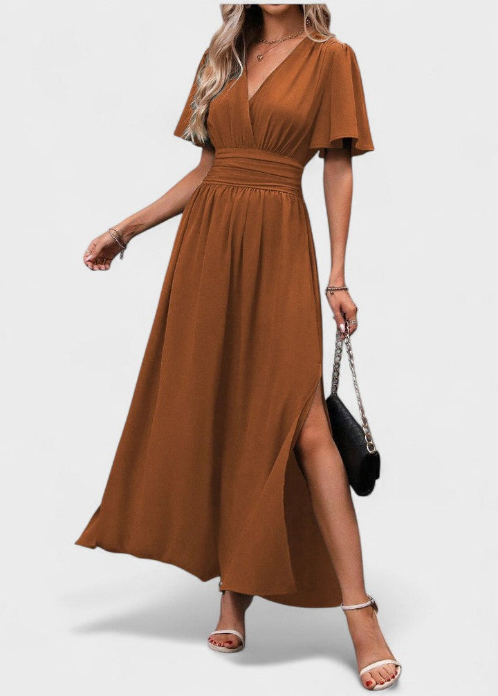 Eterna | Elegantní dlouhé černé šaty s výstřihem do V, průhlednými rukávy a rozparkem