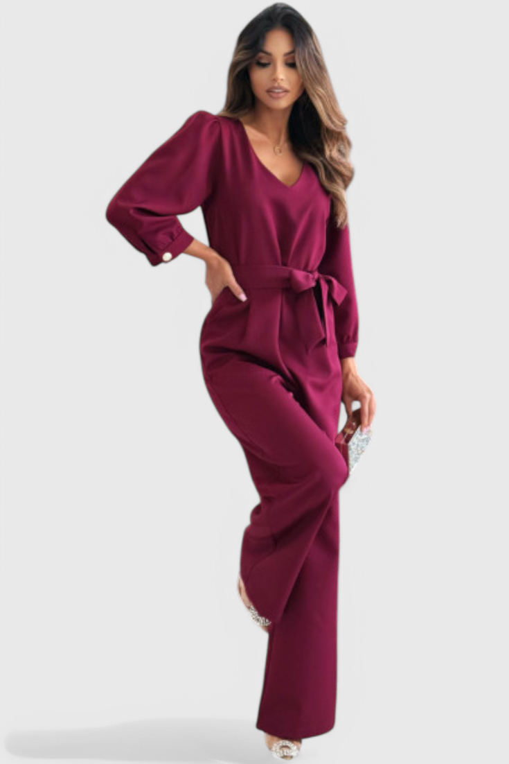 Ariane | Jednobarevné volné kalhoty s výstřihem do V a páskem