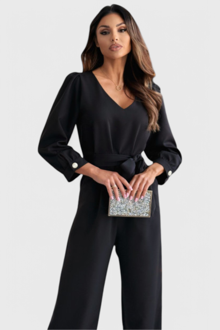 Ariane | Jednobarevné volné kalhoty s výstřihem do V a páskem